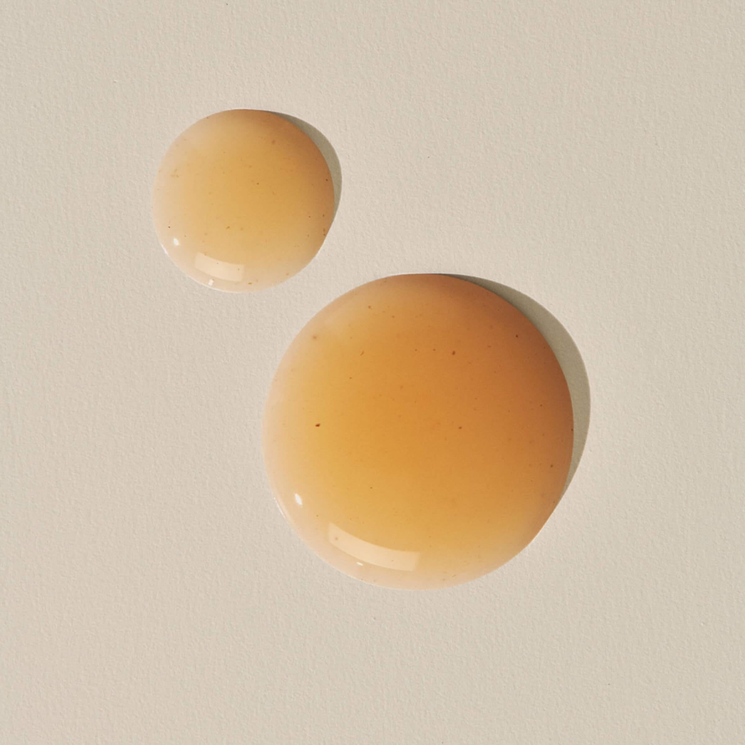 Skincare serum with Vitamin C and Niacinamide to effectively reduce dark spots and brighten skin tone