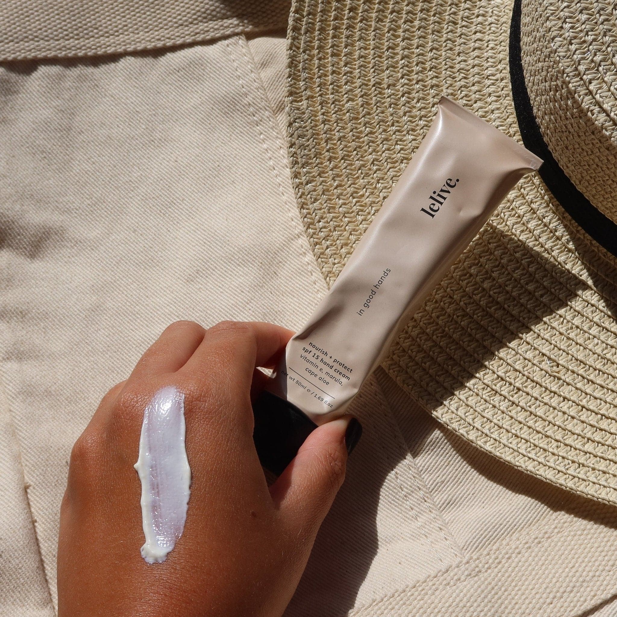 in good hands | nourish + protect spf 15 hand cream - lelive